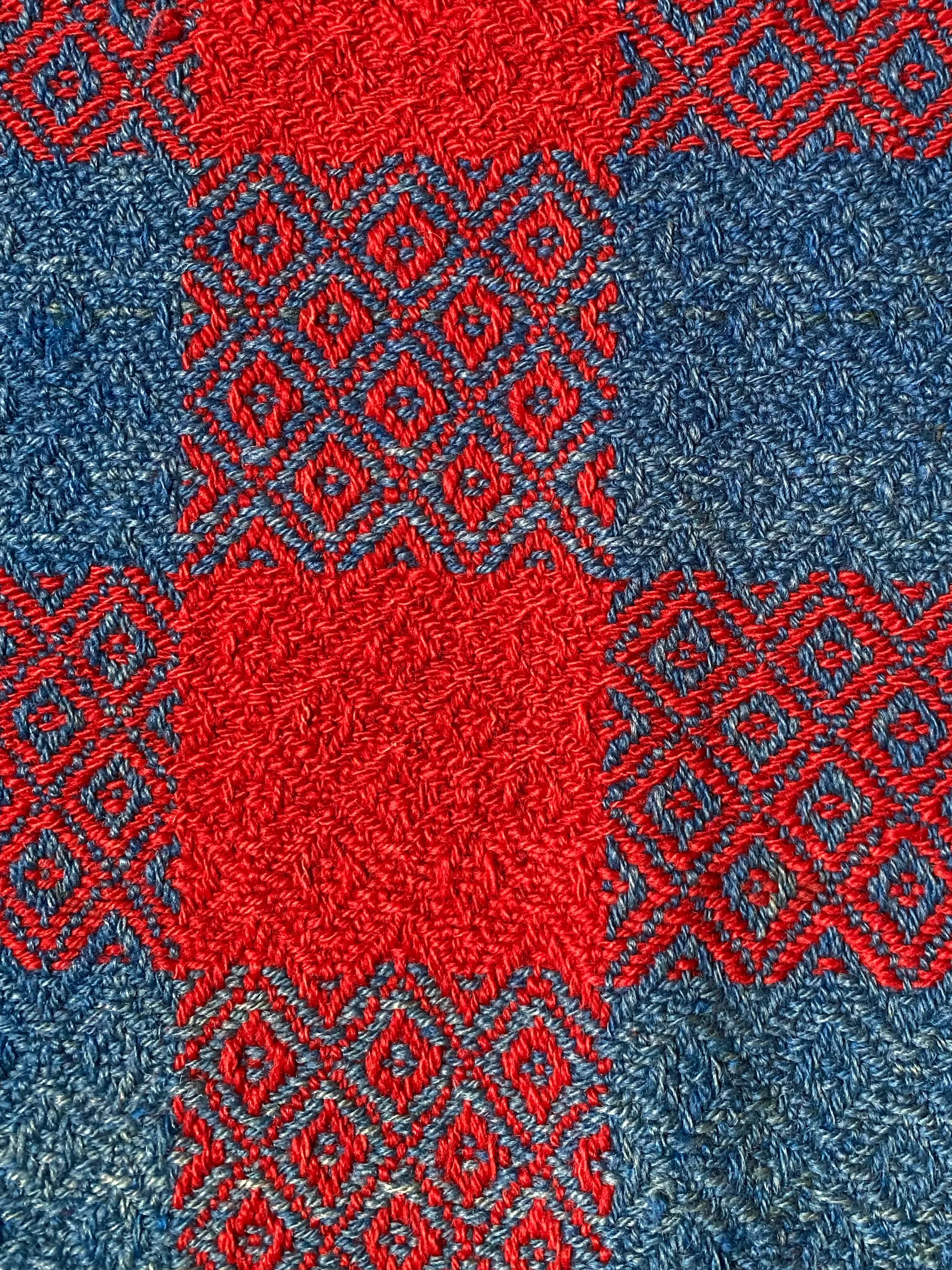 red and indigo blue coverlet cocoon